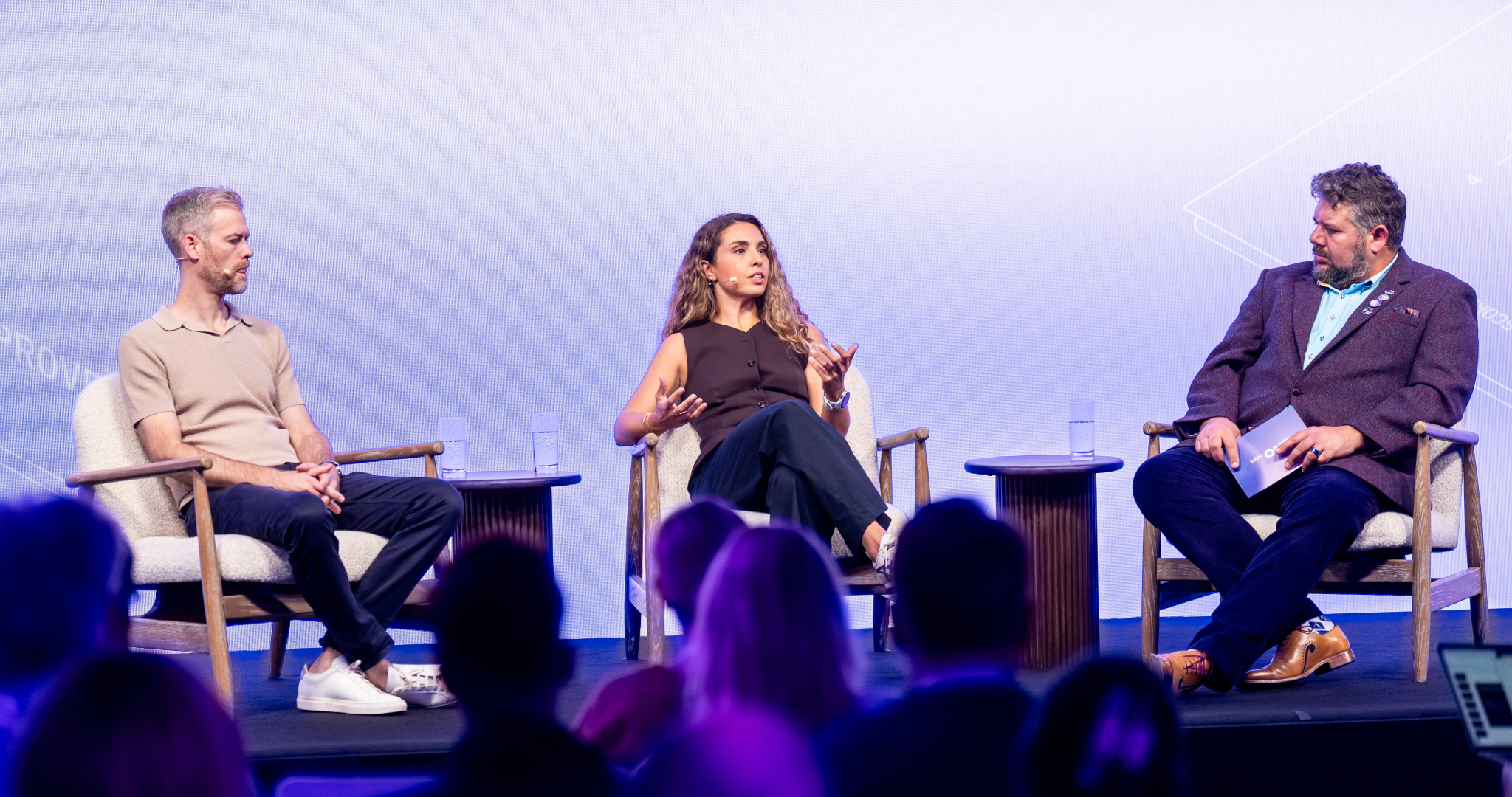 Fritz Singer, Beatriz Lourenço, and Jim Miller on stage at Ashby One London 2026 discussing hiring excellence.